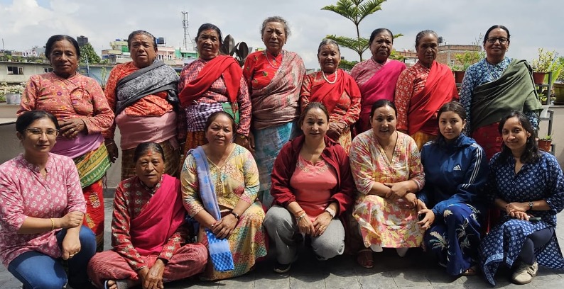 Small Earth Nepal Director Succhita Shrestha with community group. Photo: SEN